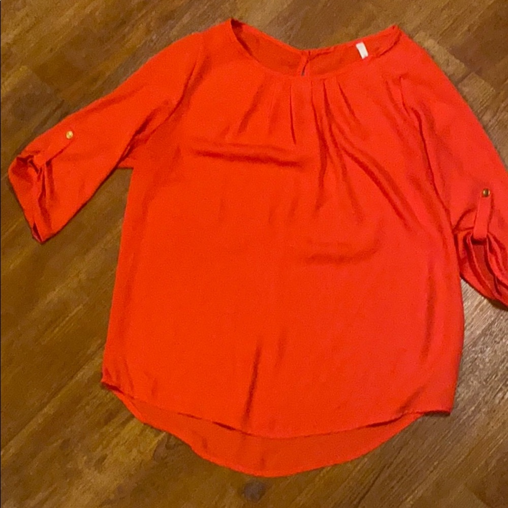 Bright red blouse